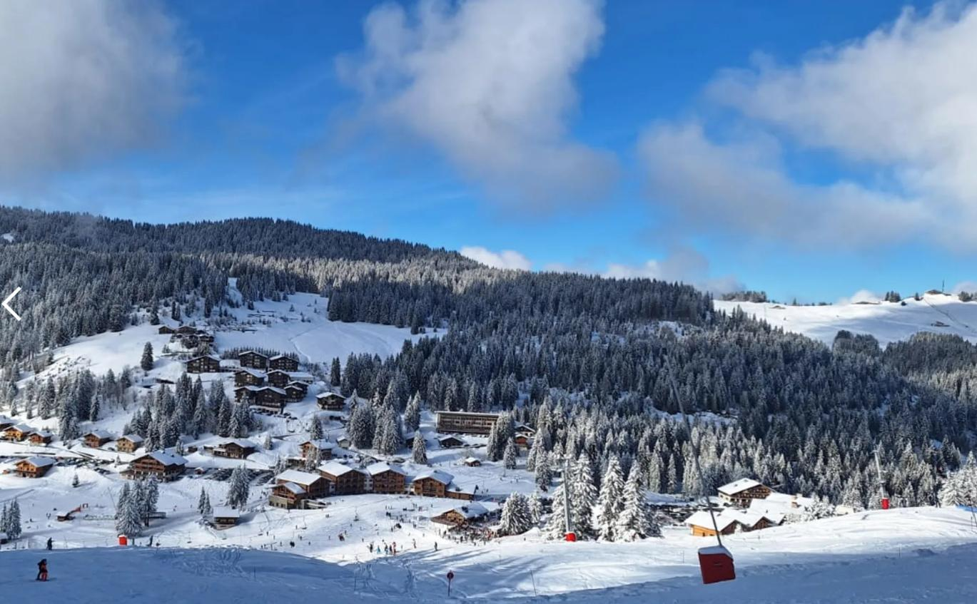 Aerial view of the Manigod / La Clusaz ski area with the Maison des Bois residence