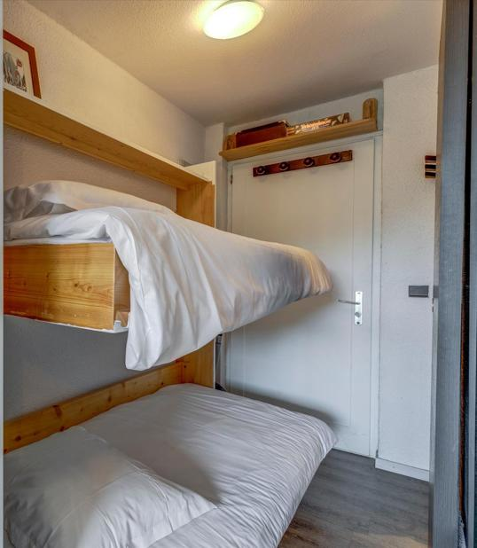 Fold-away beds unfolded in the entrance hall